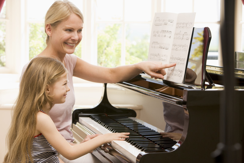blonde music teacher and child canstockphoto1874042